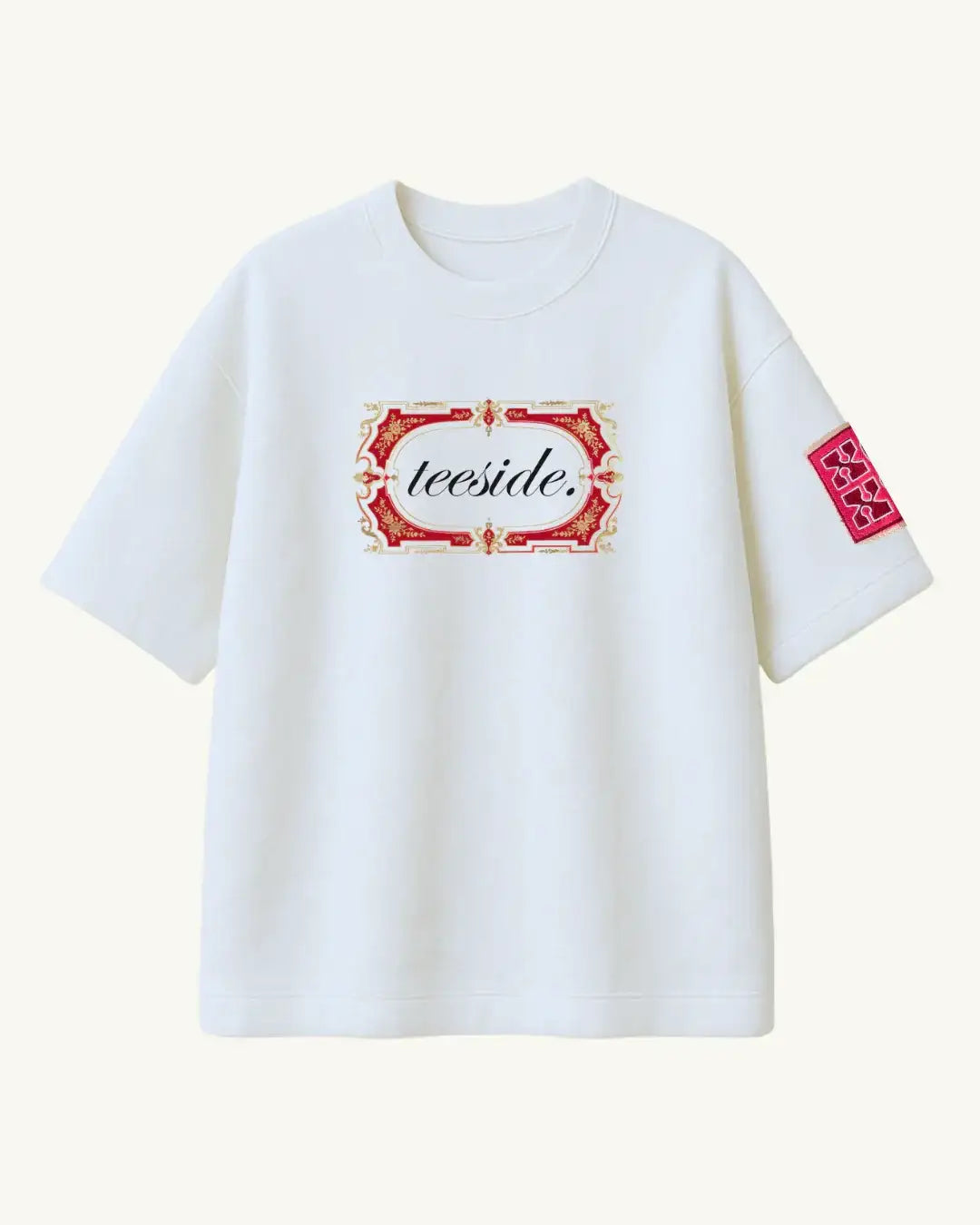 White t-shirt with ornate red and gold frame, teeside logo, and sleeve patch design