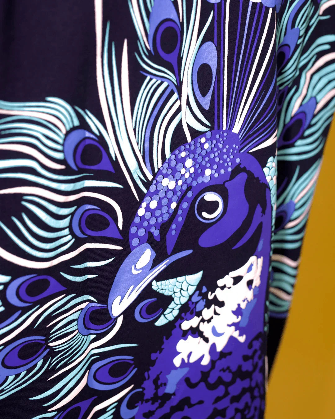 teeside vibrant peacock print shirt with detailed blue and purple feathers