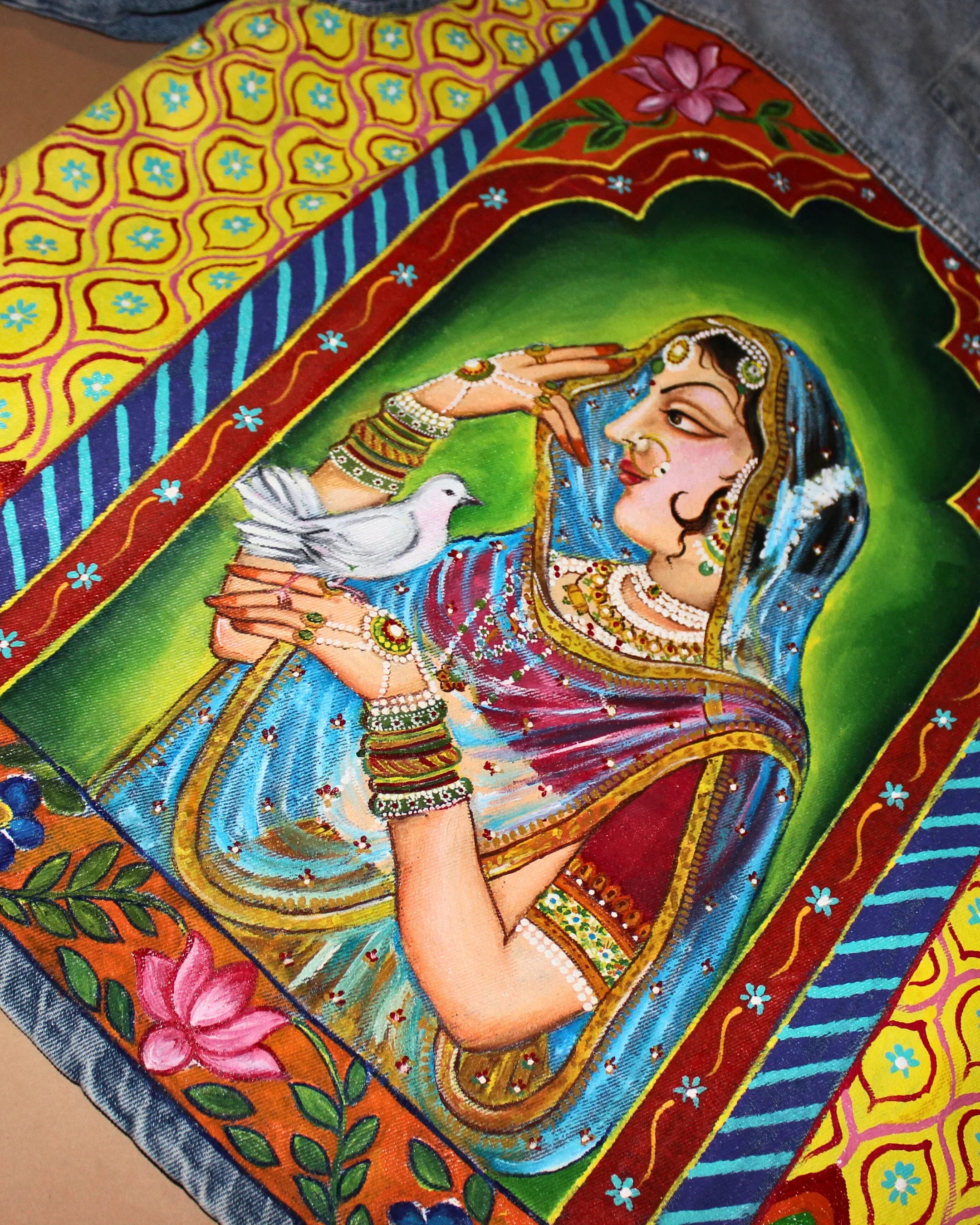 teeside vibrant hand-painted woman in traditional attire with dove, floral and geometric border