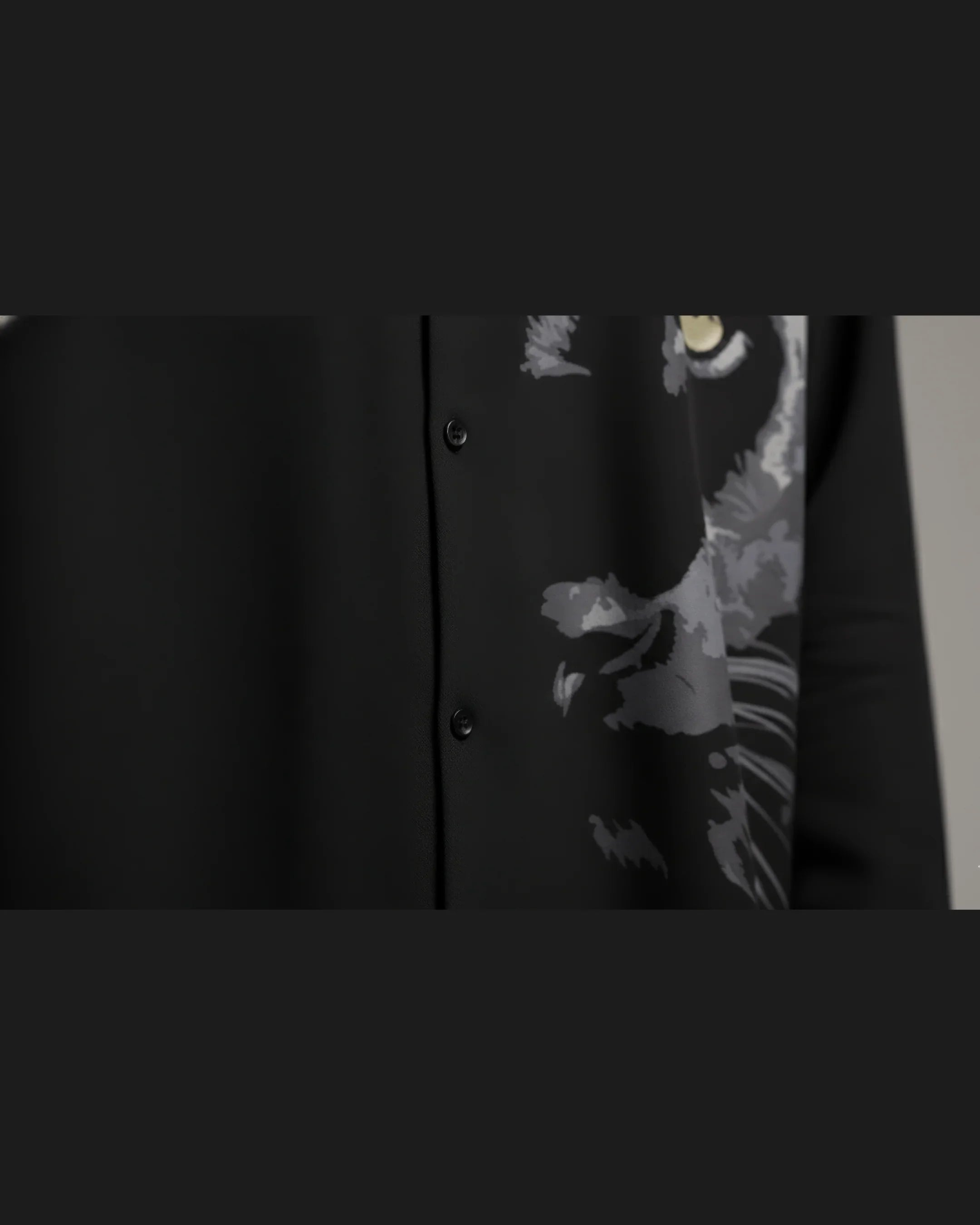Teeside black shirt with tiger face graphic and button-up front detail