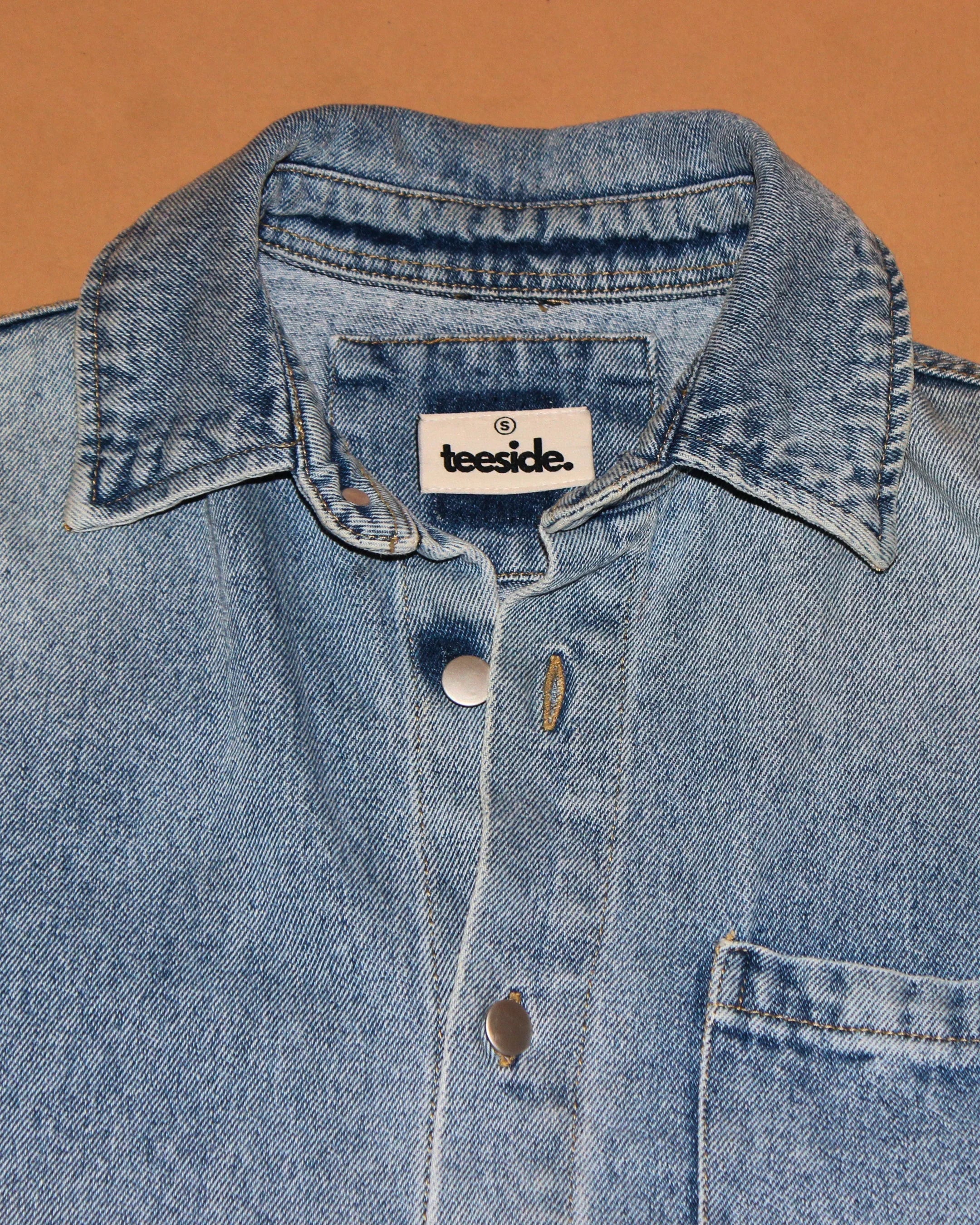 teeside light blue denim shirt with snap buttons and front pocket close-up